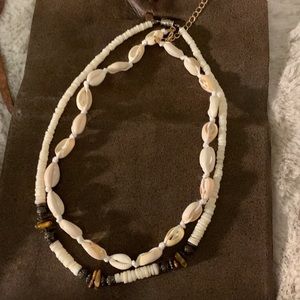 Two necklaces perfect beachwear! Natural puka shell & tigers eye!
